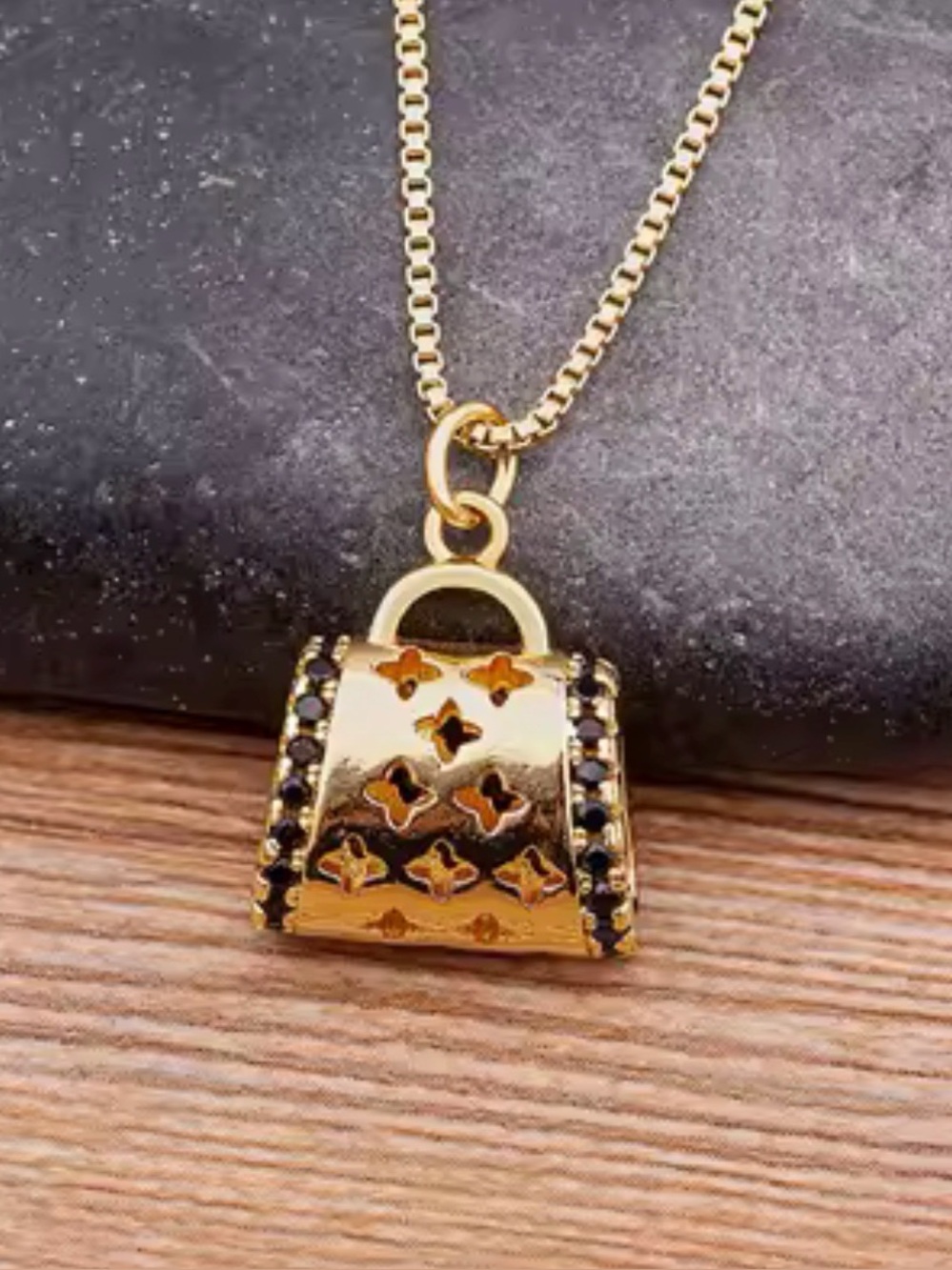 Gold Mini Handbag Pendant Necklace with Black Stones